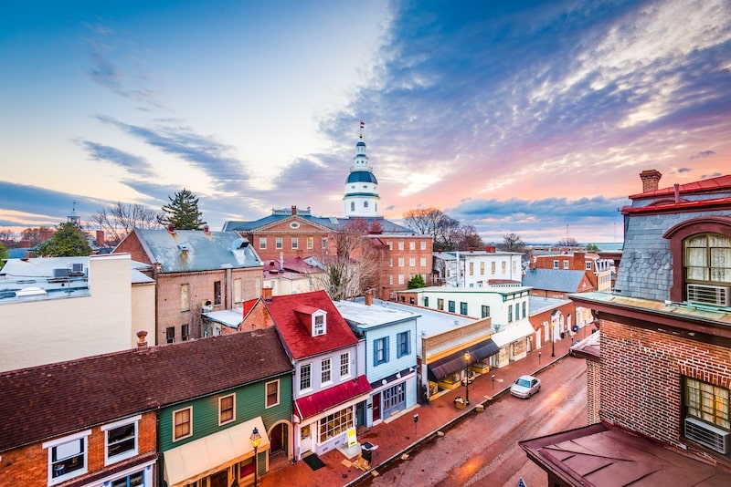 Sunset over Annapolis, Maryland with historic dome and colorful rooftops
