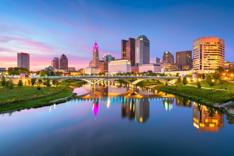 Columbus Ohio skyline with river reflection at dusk